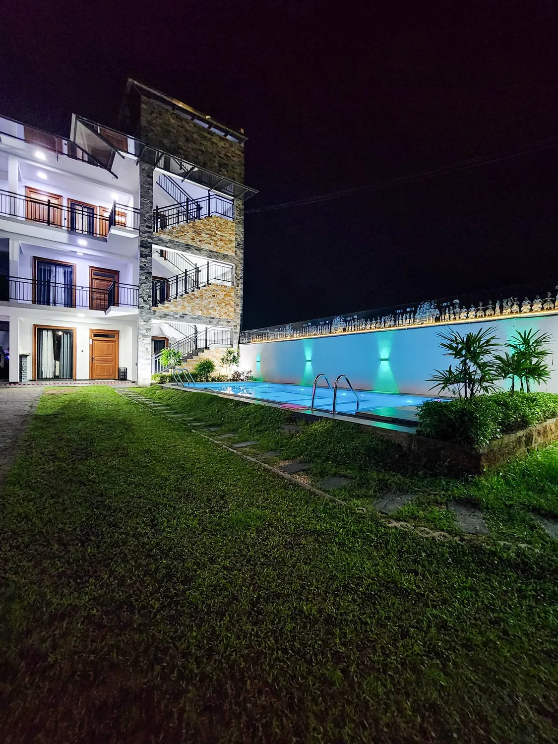 Villa 777 illuminated at night